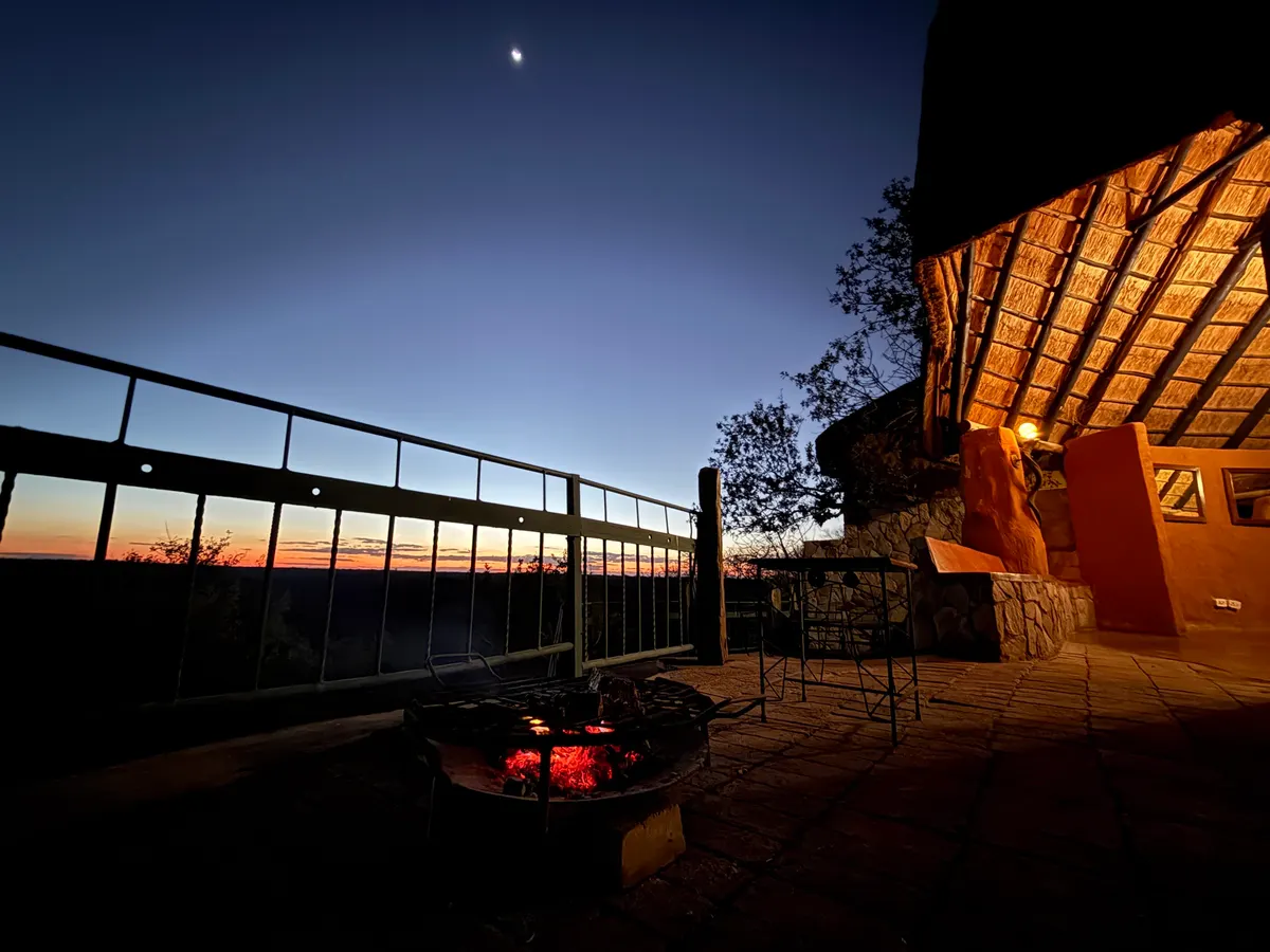 The boma fire at dusk at Khami Lodge