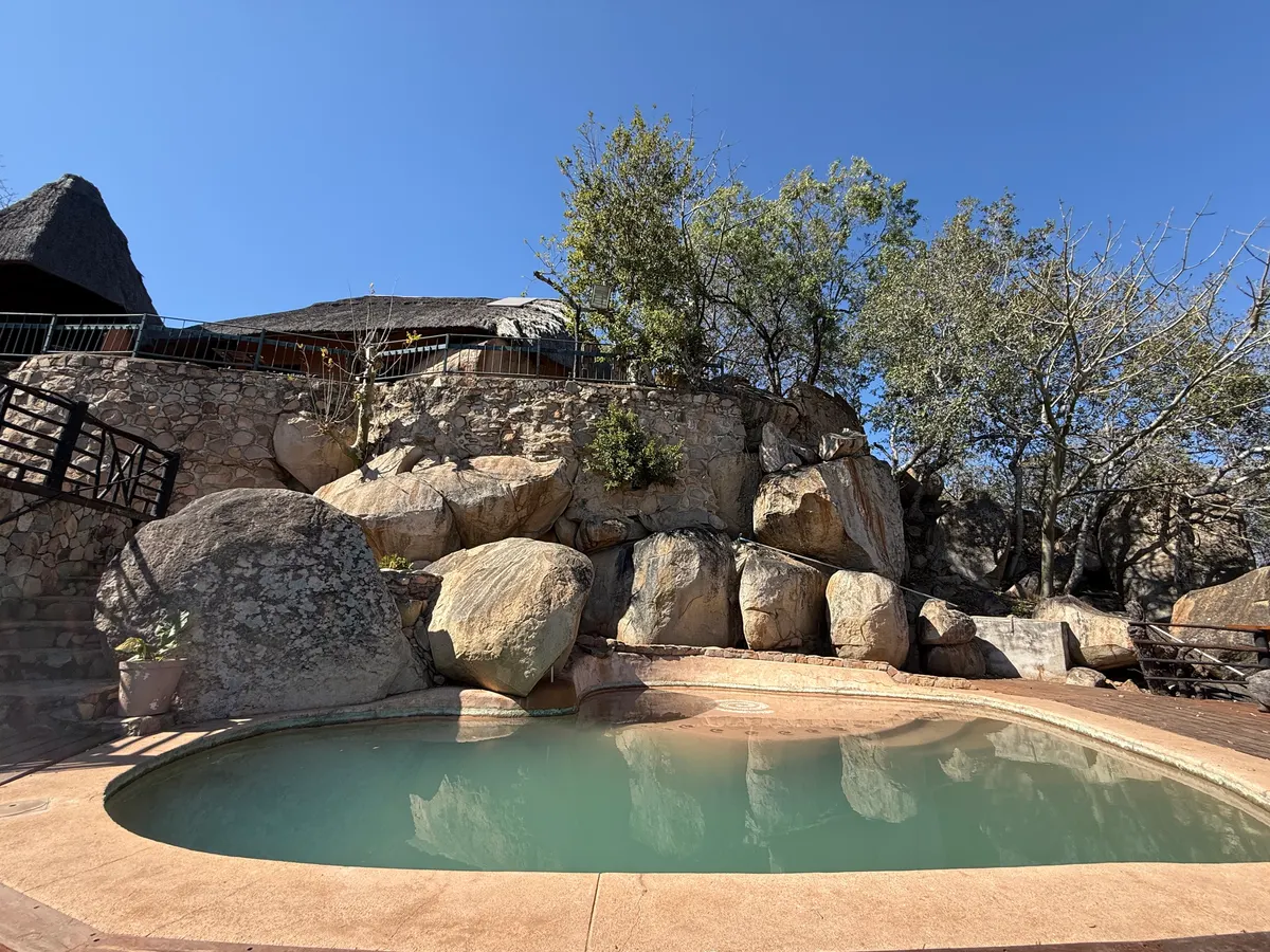The pool among granite boulders